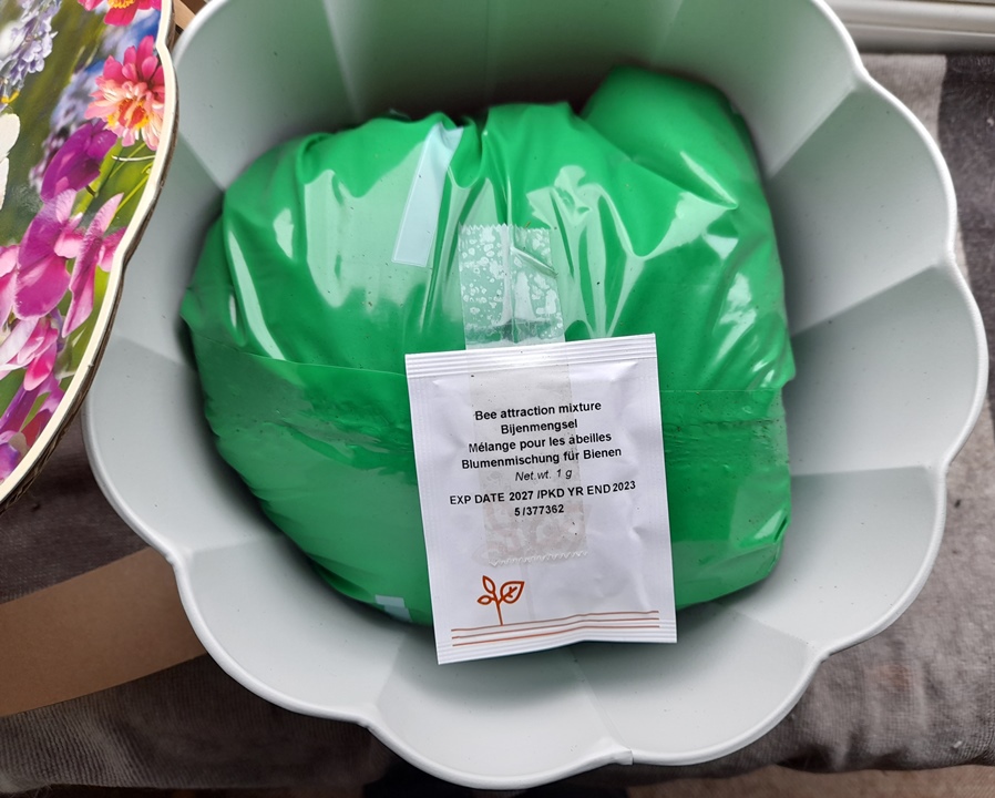 inside is the compost and seed packet